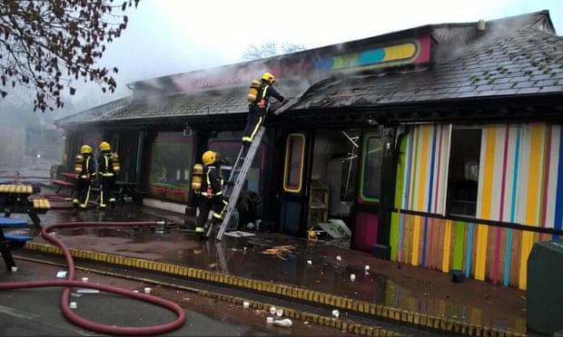 Firefighters tackle the blaze on Saturday morning.