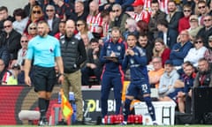 Antony on the touchline with Erik ten Hag