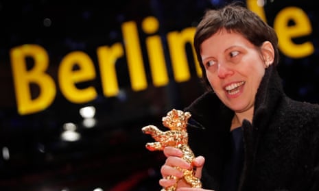 Adina Pintilie poses with her Golden Bear award for Best Film Touch Me Not during the awards ceremony at the 68th Berlinale International Film Festival in Berlin.