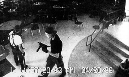Eric Harris, left and Dylan Klebold, right, caught on CCTV during the 20 April, 1999 shooting at Columbine High School.