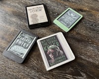 e-readers arranged together on a floor