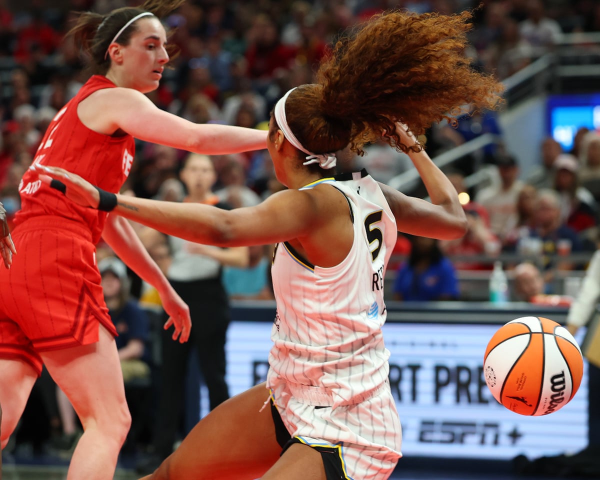 WNBA investigating claims of racist comments during Clark-Reese game | Caitlin Clark | The Guardian