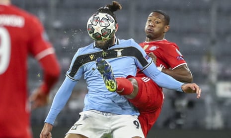 Bayern’s David Alaba, right, vies for the ball with Lazio’s Vedat Muriqi.