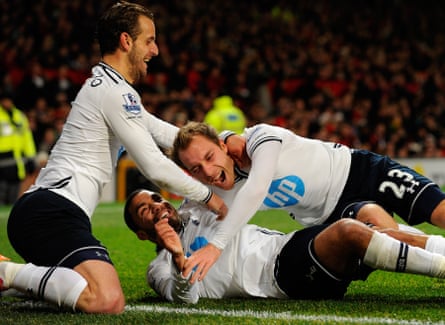 Roberto Soldado (left) and Aaron Lennon celebrate a goal by Christian Eriksen (right) during Tottenham’s win at Manchester United on 1 January 2014.c