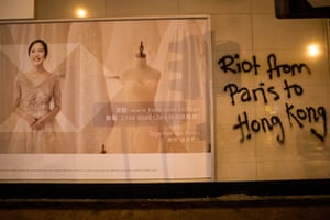 Graffiti on a street after the previous night’s pro-democracy protest on 16 September