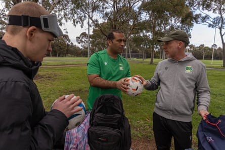 Amir Abdi and his coach David Connolly prepare for a training session in Melbourne.