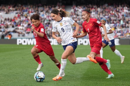 Savannah DeMelo, who made the US World Cup team as an uncapped player, is marked by Vietnam’s Nguyen Thi Bich Thuy and Luong Thi Thu Thuong during the second half.