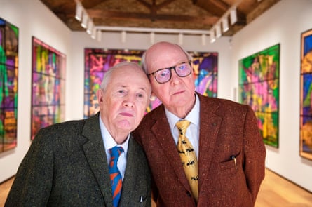 Dates and dandelions … Gilbert and George with the pictures from the inaugural show.