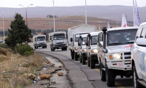 Vehicles carrying food, medicine and blankets, leave the Syrian capital Damascus as they head to the besieged town of Madaya
