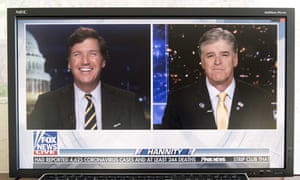 Sean Hannity, right, with fellow Fox News host Tucker Carlson.