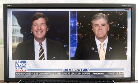 Sean Hannity, right, with fellow Fox News host Tucker Carlson.