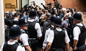 Journalists and residents outside meeting