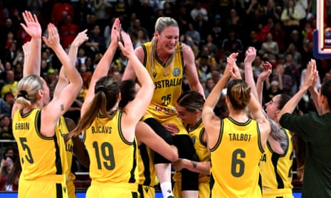 Australia's Lauren Jackson is applauded by teammates after playing a key role in their basketball World Cup bronze medal in Sydney on Saturday.