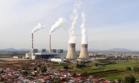 emissions rising from factory chimneys