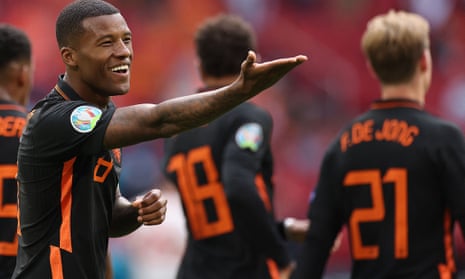 Georginio Wijnaldum shows his delight after scoring the Netherlands’ third goal