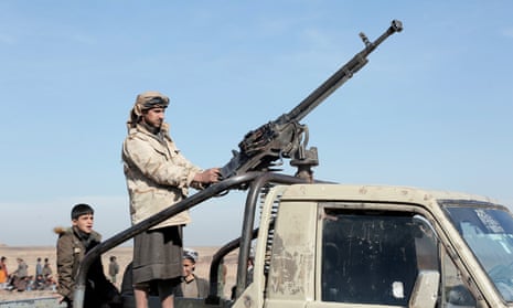 A Houthi fighter manning a machine gun mounted on a vehicle during a tribal parade held against the United States-led aerial attacks launched on sites in Yemen, and solidarity with Palestinians, on January 22, 2024, near Sana’a, Yemen.