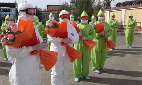 Ministry of Health officials thank hospital staff who treated coronavirus patients in Tashkent, Uzbekistan.