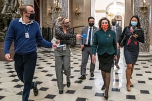 Speaker of the House Nancy Pelosi, walks from the House floor to her office on Capitol Hill. The House is voting on a measure to increase direct stimulus payments to Americans to $2,000 each