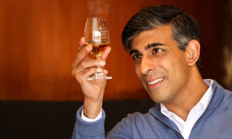Britain’s Prime Minister and Conservative Party Leader Rishi Sunak reacts during a general election campaign visit to the Cotswolds Distillery in Whichford, central England, on 1 July 2024.