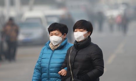 Women wearing smog masks