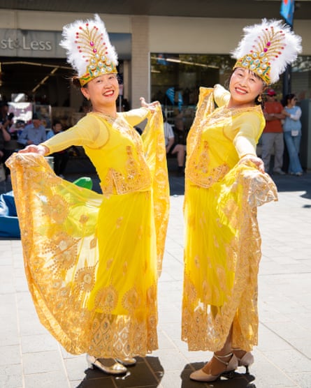 Jane Liu and Julie Yang of the Happy Birds Dancing Group during the Harmony in the Bridge event, in Ballarat