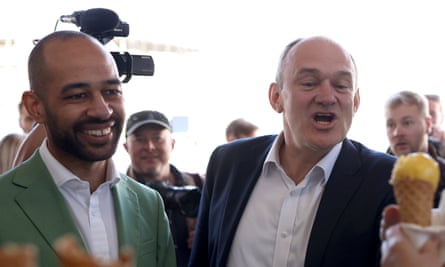 Josh Babarinde with the Lib Dem leader, Ed Davey, in Eastbourne in May.
