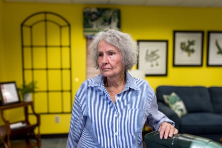 a woman looks to the side