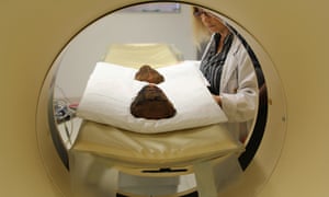 Helen Laurendet, a senior radiographer at the University of Sydney, prepares the ibis mummies for scanning.