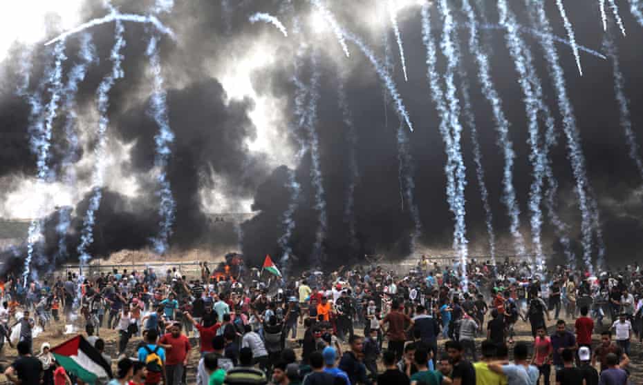 Israeli army fires tear-gas at Palestinian protesters during clashes on Friday 4 May. 