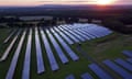 An array of solar power panels in a field