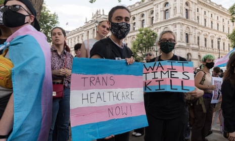 Transgender people and their supporters outside Downing Street call on the UK government to urgently reform the Gender Recognition Act, on 6 August 2021.