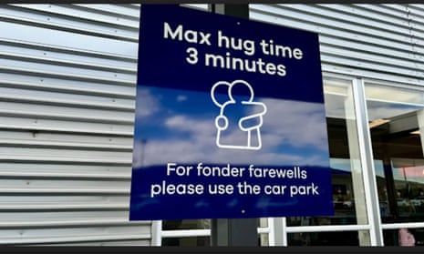 New Zealand airport causes stir with sign capping goodbye cuddles to 3 minutes | New Zealand