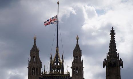 The Union Flag flies at half-mast from Victoria Tower over the Houses of Parliament in central London.