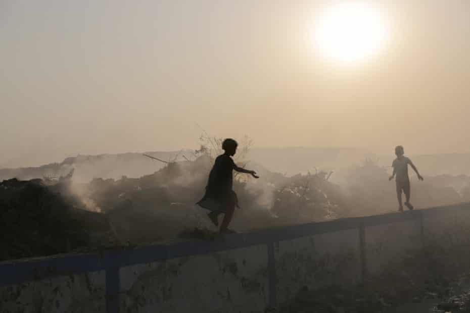 Children play in Calcutta, one of the most polluted cities in India