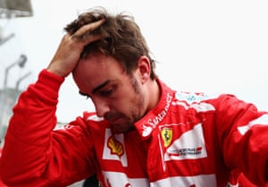 Ferrari’s Fernando Alonso cuts a desolate figure after the Brazilian Grand Prix.