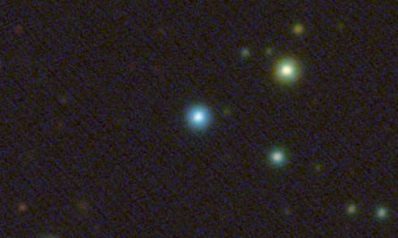 A colour image from the SkyMapper Southern Sky Survey shows the growing black hole as a bright blue source.