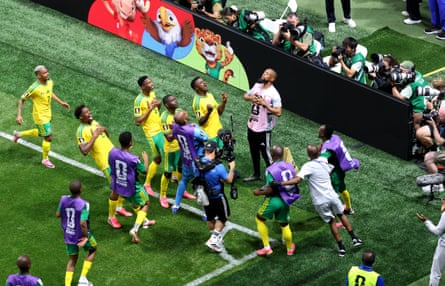 South Africa players and substitutes celebrate near the corner flag celebrate after scoring against Czechia in the first group game.