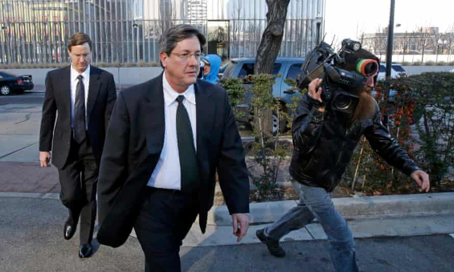 Lyle Jeffs, foreground, and his brother Nephi leave the federal courthouse in Salt Lake City