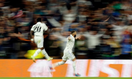 Real Madrid’s Karim Benzema celebrates scoring their first goal with Vinicius Junior.