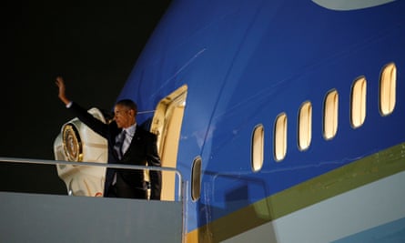 Barack Obama waves as he departs Joint Base Andrews in Washington on his way to Athens.