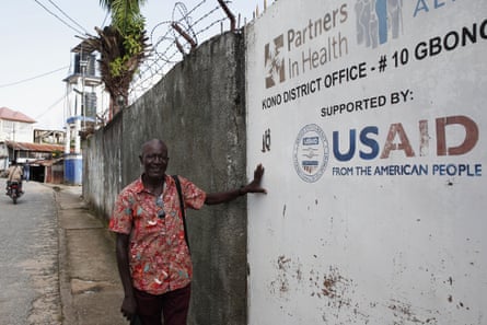 David Kpakiwa near a health project in Koidu Town.