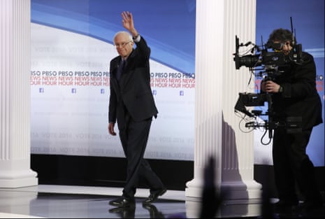 Bernie Sanders takes the stage before the Democratic presidential primary debate.