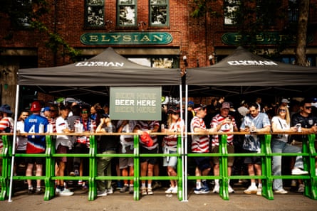 people standing outside a bar