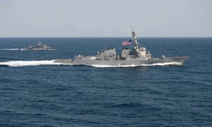 USS Lassen, seen here in formation with ROKS Sokcho (behind) earlier this year, is sailing within 12 nautical miles of artificial islands built by China in the South China Sea.