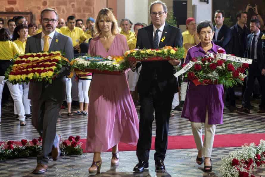 The Catalan regional president, Quim Torra (second right) attends a ceremony at the tomb of Rafael Casanova in Barcelona province.