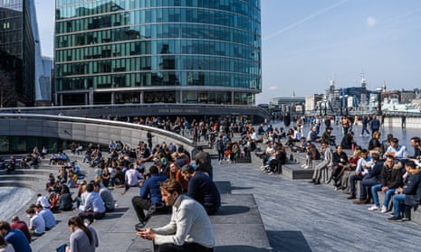 Crowds in London enjoy the spring sunshine in March 2022 following the end of all coronavirus restrictions.