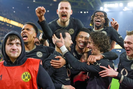 Borussia Dortmund’s players observe aft coming from 2-0 down to hit Hamburg 3-2 pinch 3 goals successful 11 second-half minutes.