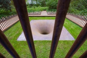 Suck caged hole sculpture by Anish Kapoor at Jupiter Artland outside Edinburgh