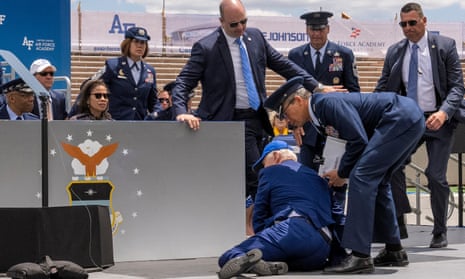 Joe Biden falls on stage during the 2023 US Air Force Academy graduation ceremony in Colorado Springs, Colorado.