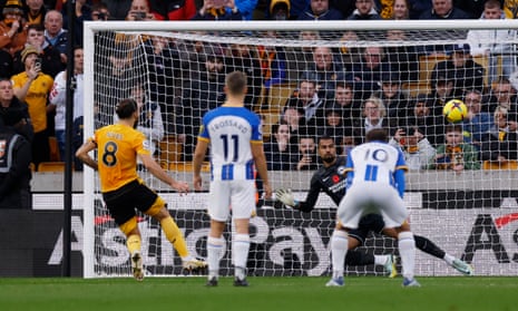 Ruben Neves scores from a penalty.